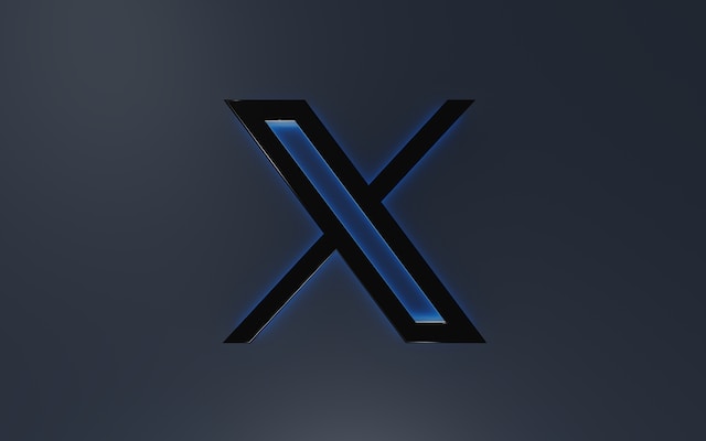 Ilustrasi logo X hitam yang disinari cahaya biru pada latar belakang abu-abu.