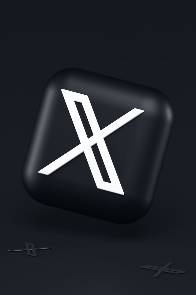 Grafica in bianco e nero del logo dell'app X.
