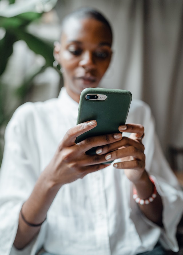 A woman using her smartphone.