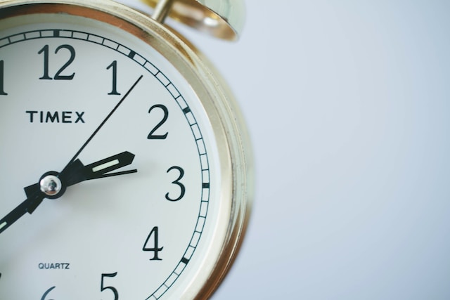 A photo of a Timex analog clock on a white background.