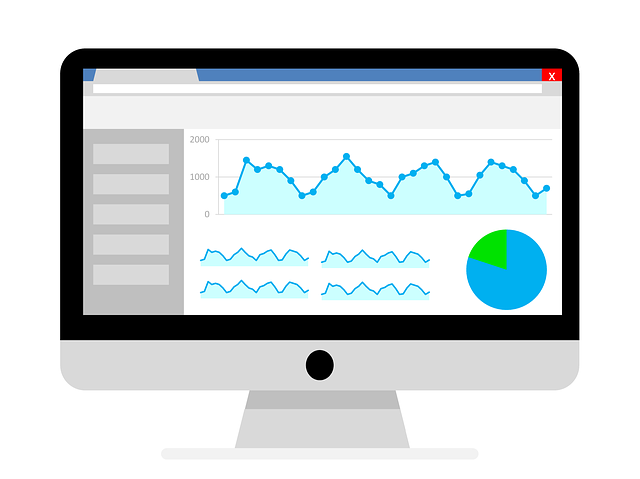 An illustration of a white desktop monitor displaying some analytic graph and pie chart.