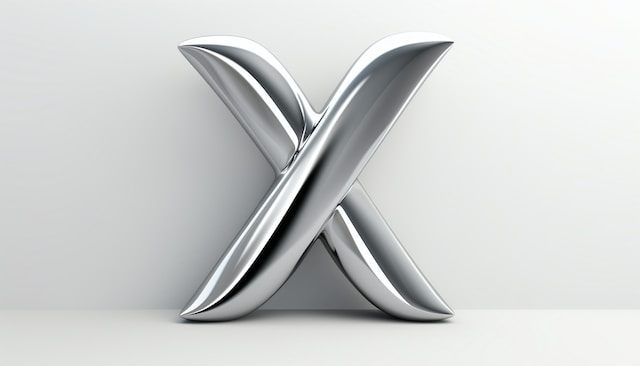 A picture of a metallic X logo on a white background.