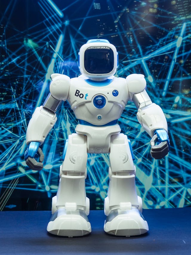 A close-up of a robot toy in a white space suit.