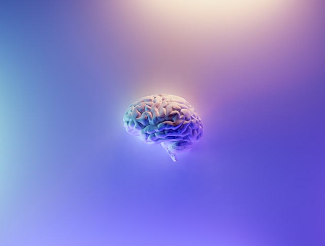 A 3D render of a human brain on a purple and blue background.